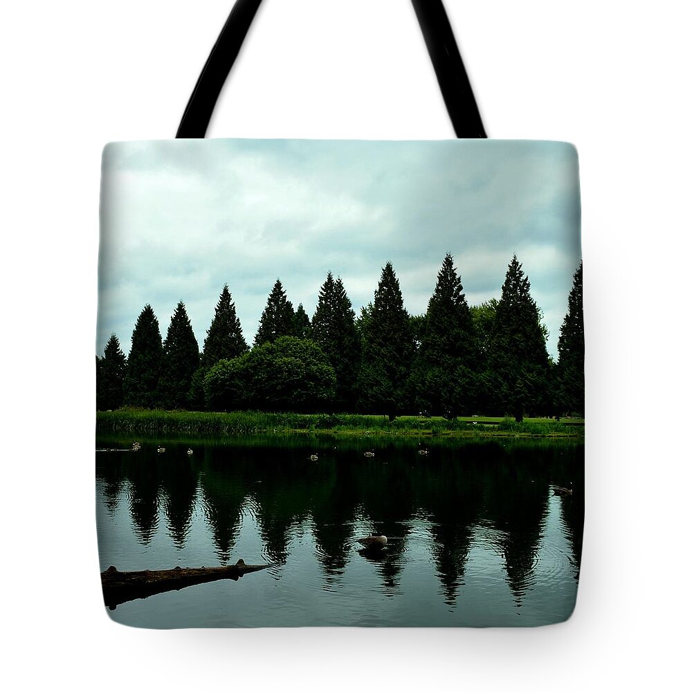 Reflection Tote Bag featuring the photograph A Gaggle of Pines by Laureen Murtha Menzl