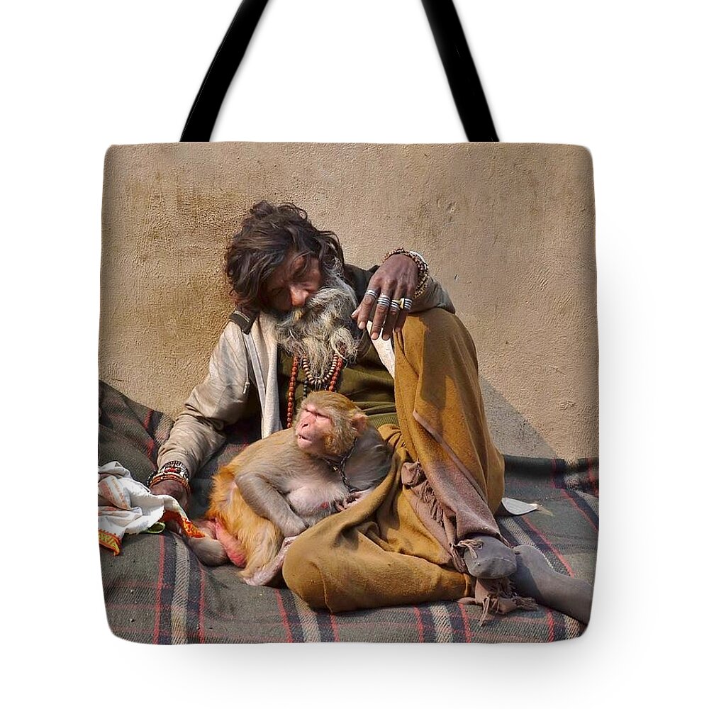 Portrait Tote Bag featuring the photograph A Man and His Monkey - Varanasi India by Kim Bemis