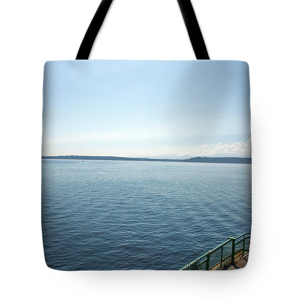 Child Tote Bag featuring the photograph A Mother And Son Standing On A Ferry by Adam Hester