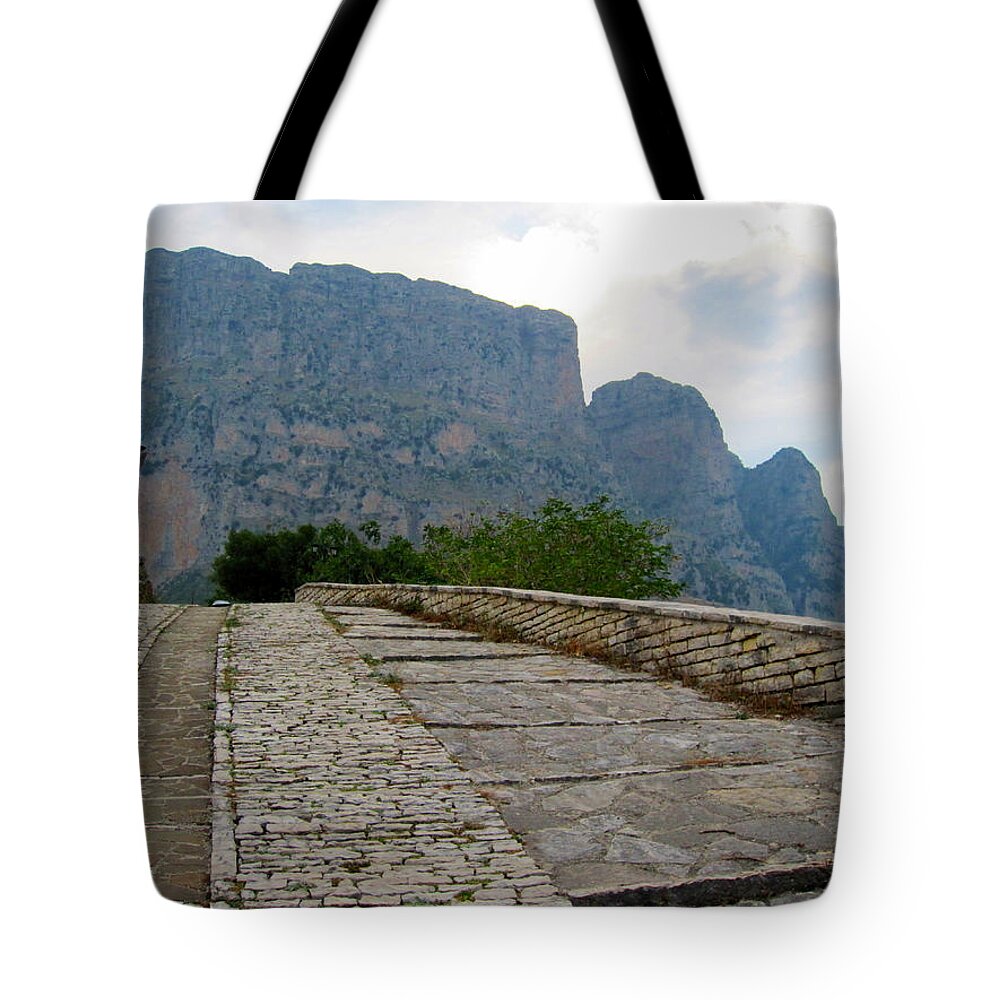 Alexandros Daskalakis Tote Bag featuring the photograph A Road to the Mountains by Alexandros Daskalakis