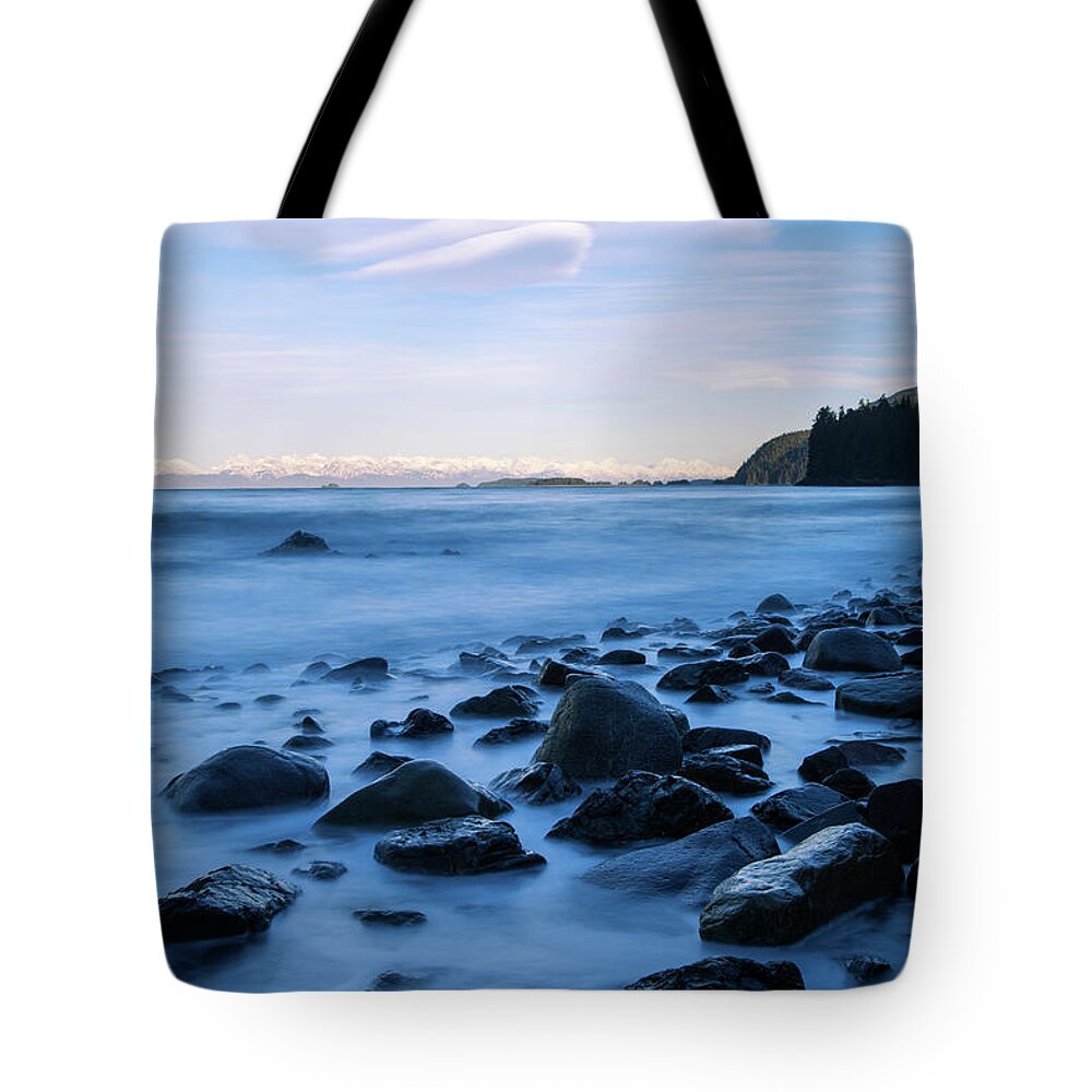 Dawn Tote Bag featuring the photograph A Rocky Shoreline Exposed During Low by John Hyde / Design Pics