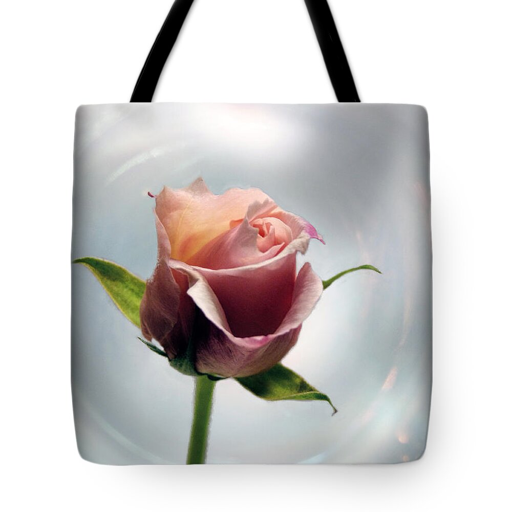 Rose Tote Bag featuring the photograph A Rose by Lynn Bolt