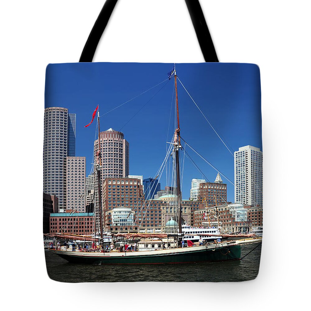 New England's Best Tote Bag featuring the photograph A Ship in Boston Harbor by Mitchell Grosky