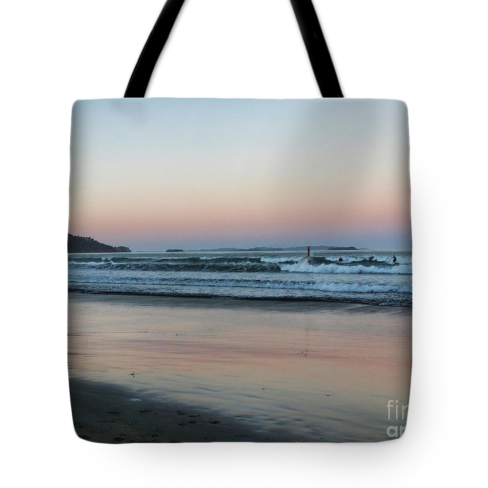 Colors Of The Rainbow Tote Bag featuring the photograph A Sunset Moment by Karen Lewis