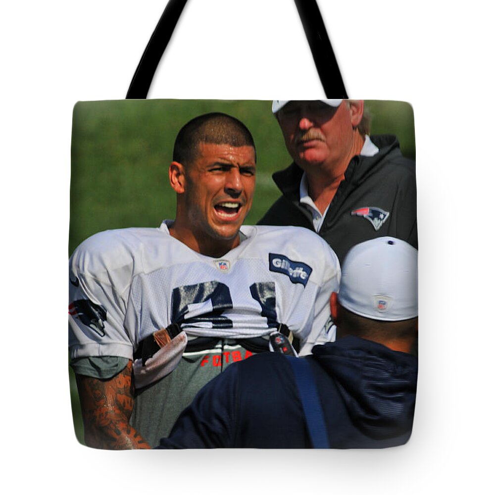 Patriot Tote Bag featuring the photograph Aaron Hernandez with Patriots Coaches by Mike Martin
