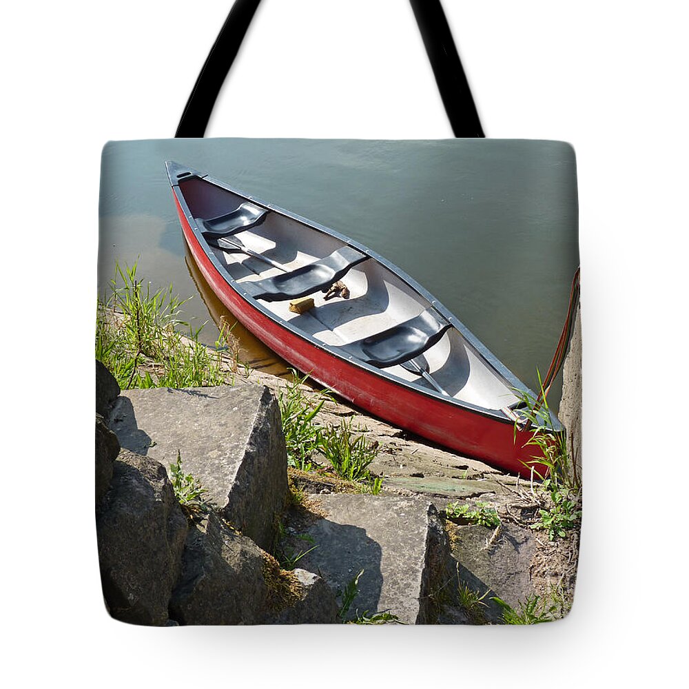Abandoned Tote Bag featuring the photograph Abandoned Boat At The Quay by Eva-Maria Di Bella