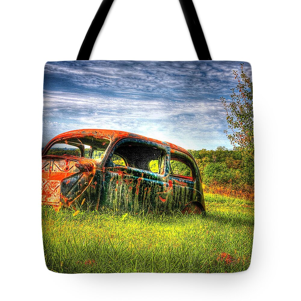 Car Tote Bag featuring the photograph Abandoned Car in Field by Roger Passman