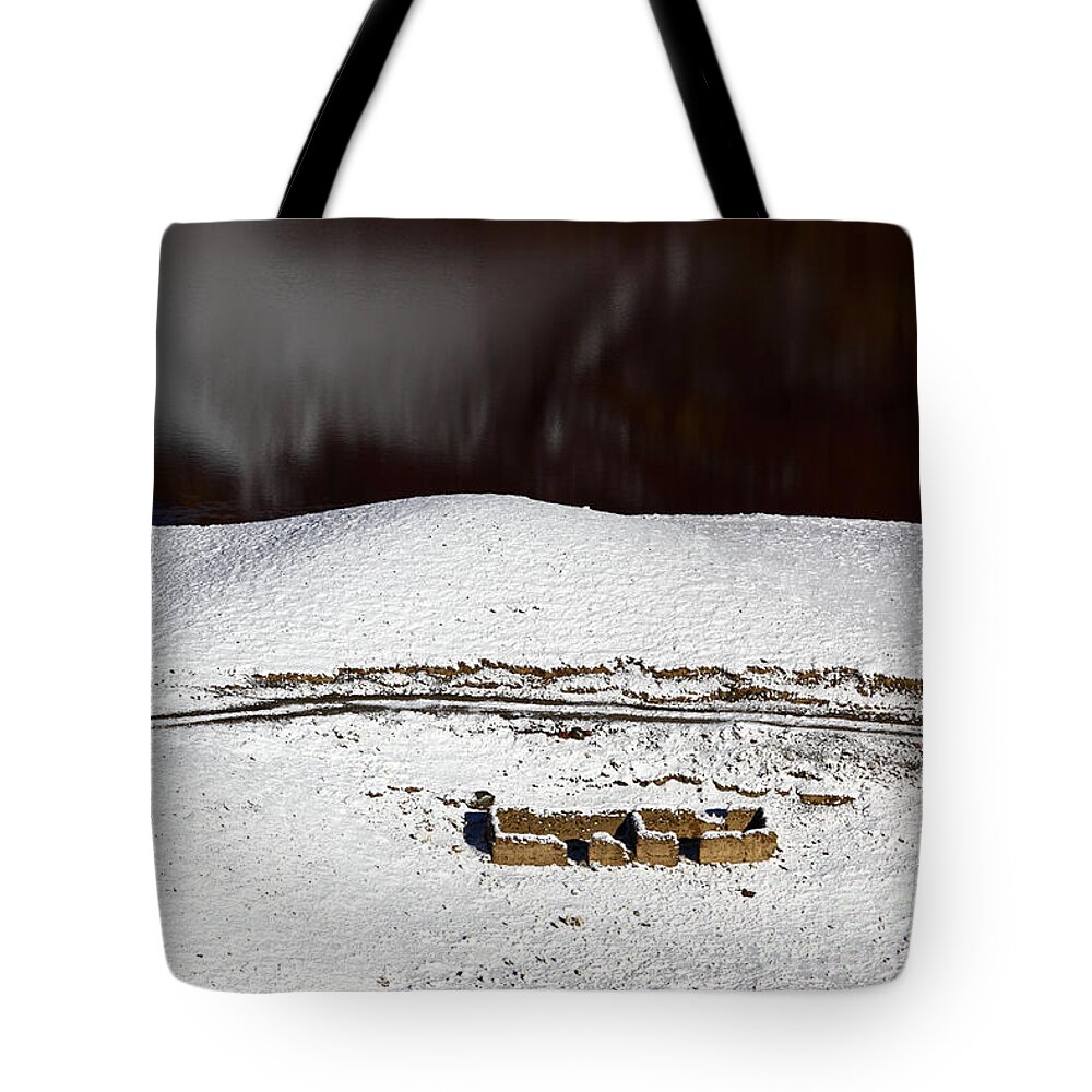 Winter Tote Bag featuring the photograph Abandoned house by the lake in winter by James Brunker