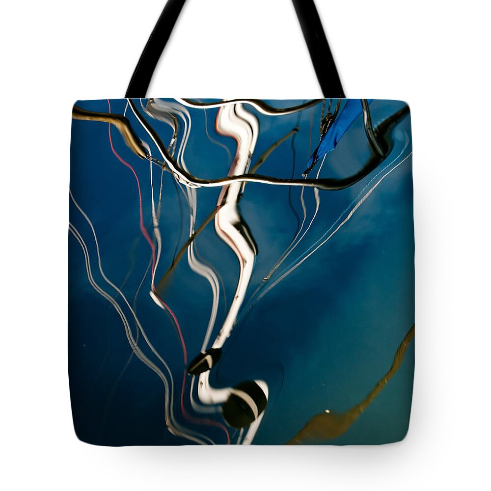Sailboat Tote Bag featuring the photograph Abstract Sailboat Mast Reflection by Jani Freimann