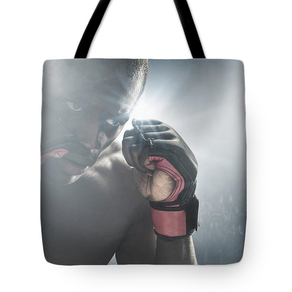 Young Men Tote Bag featuring the photograph African American Mma Boxer With Gloves by John Fedele