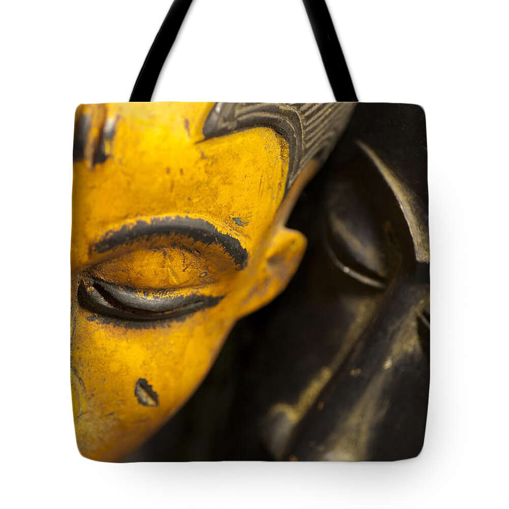 Abstract Tote Bag featuring the photograph African Masks by Raul Rodriguez