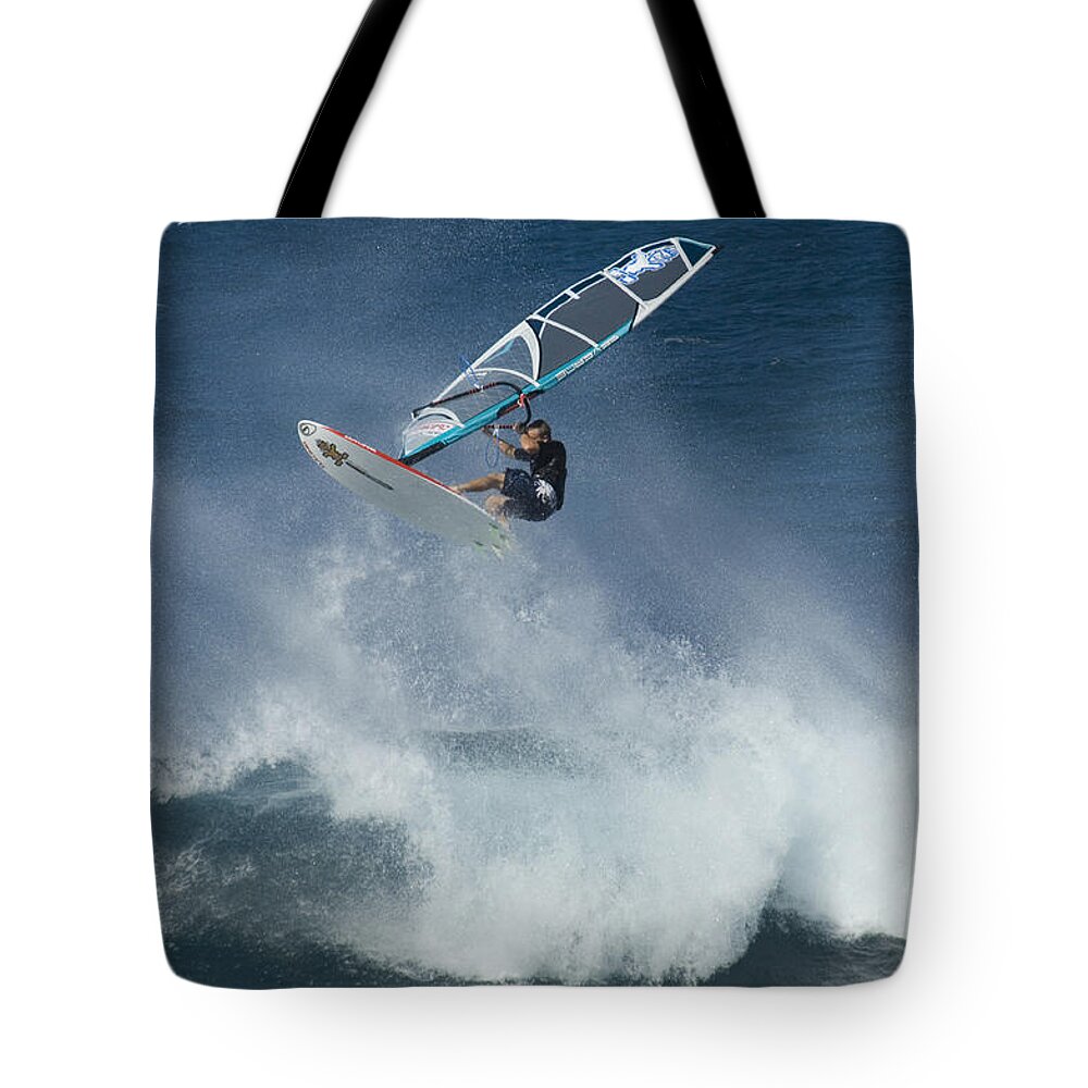 Surf Tote Bag featuring the photograph Airborn In Hawaii by Bob Christopher