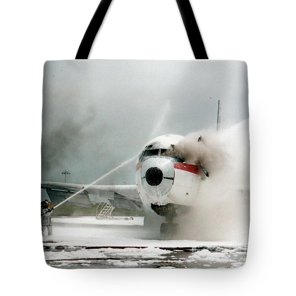 Airplane Crash Drill Tote Bag featuring the photograph Airplane Crash Drill by Jim Fitzpatrick