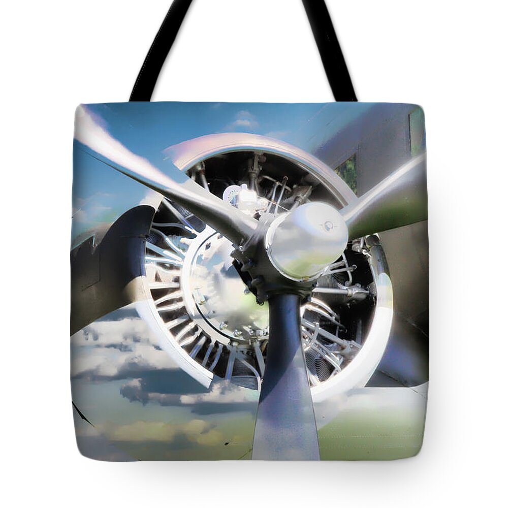 Airplane Tote Bag featuring the photograph Airplane Propeller In The Clouds by Athena Mckinzie