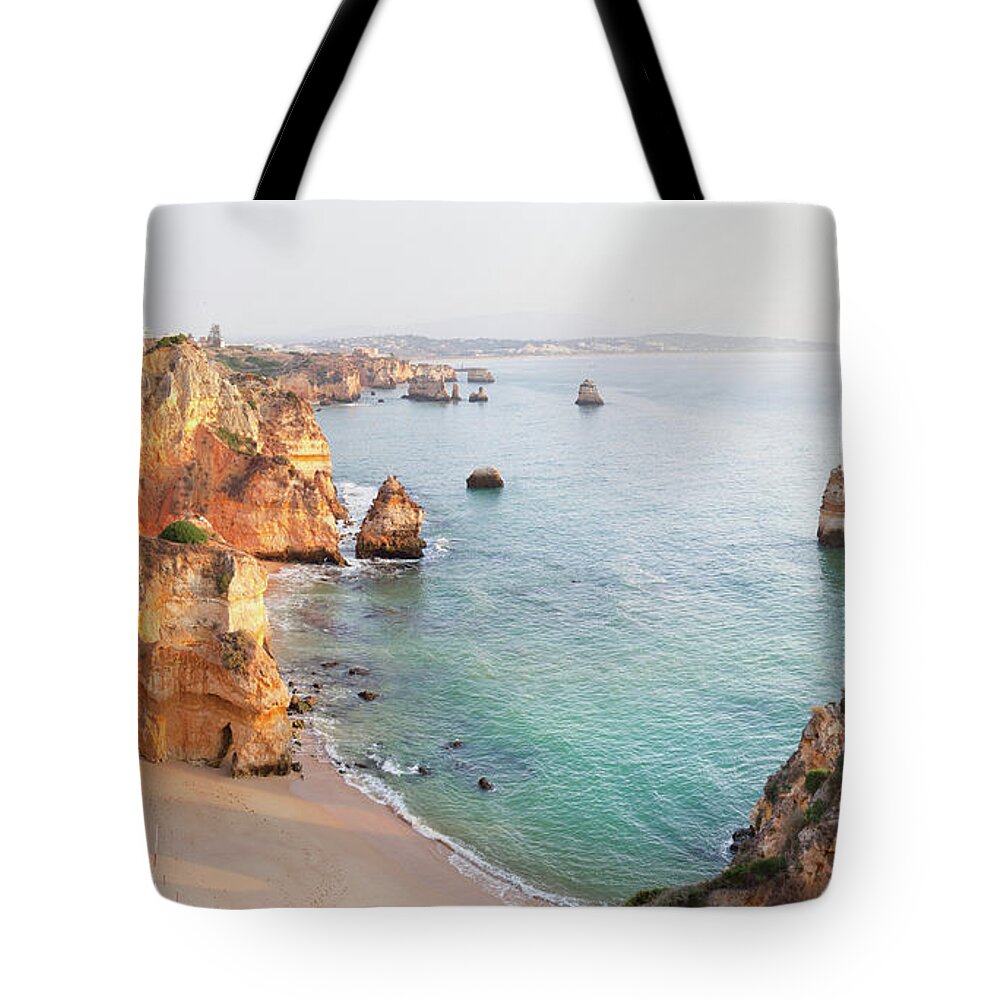 Algarve Tote Bag featuring the photograph Algarve Coastline by M Swiet Productions