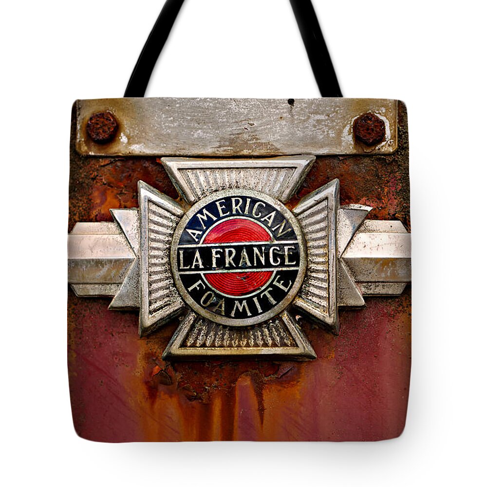 Fire Truck Tote Bag featuring the photograph American LaFrance Foamite Badge by Mary Jo Allen