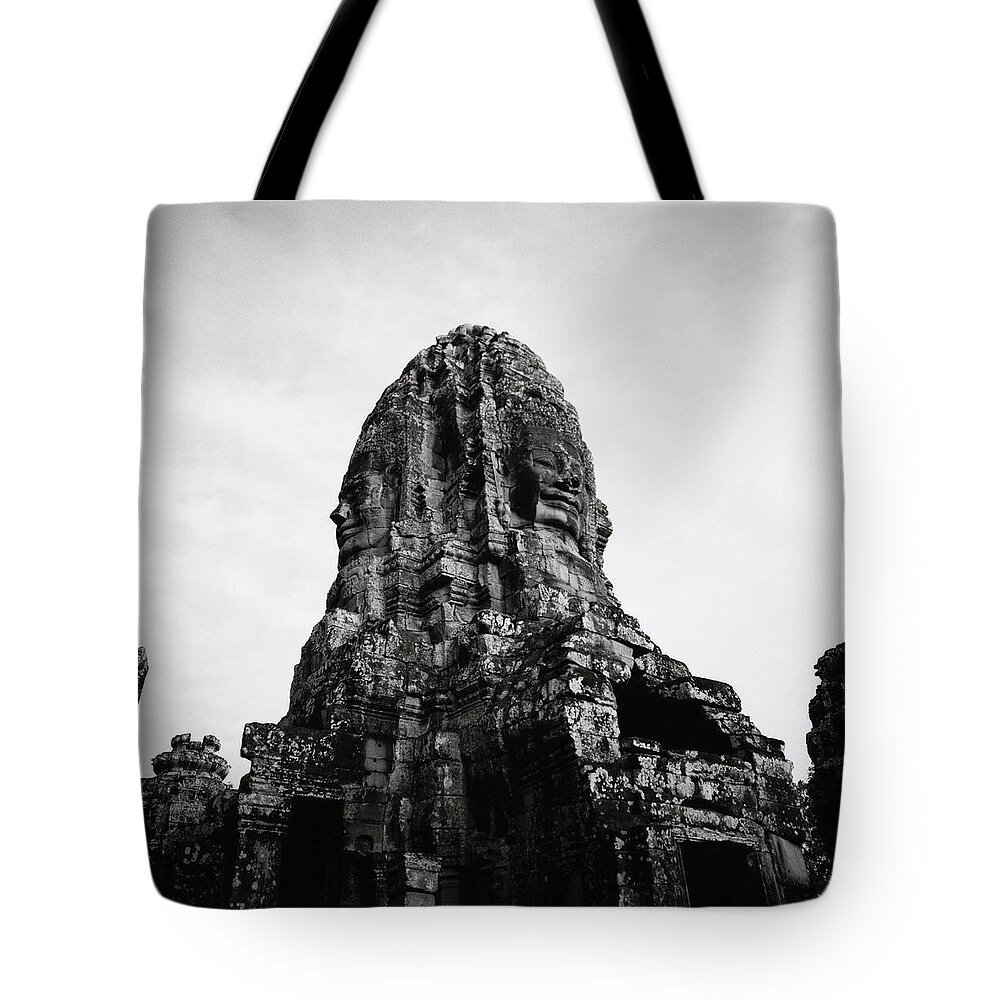 Angkor Wat Tote Bag featuring the photograph Angkor The Bayon by Shaun Higson