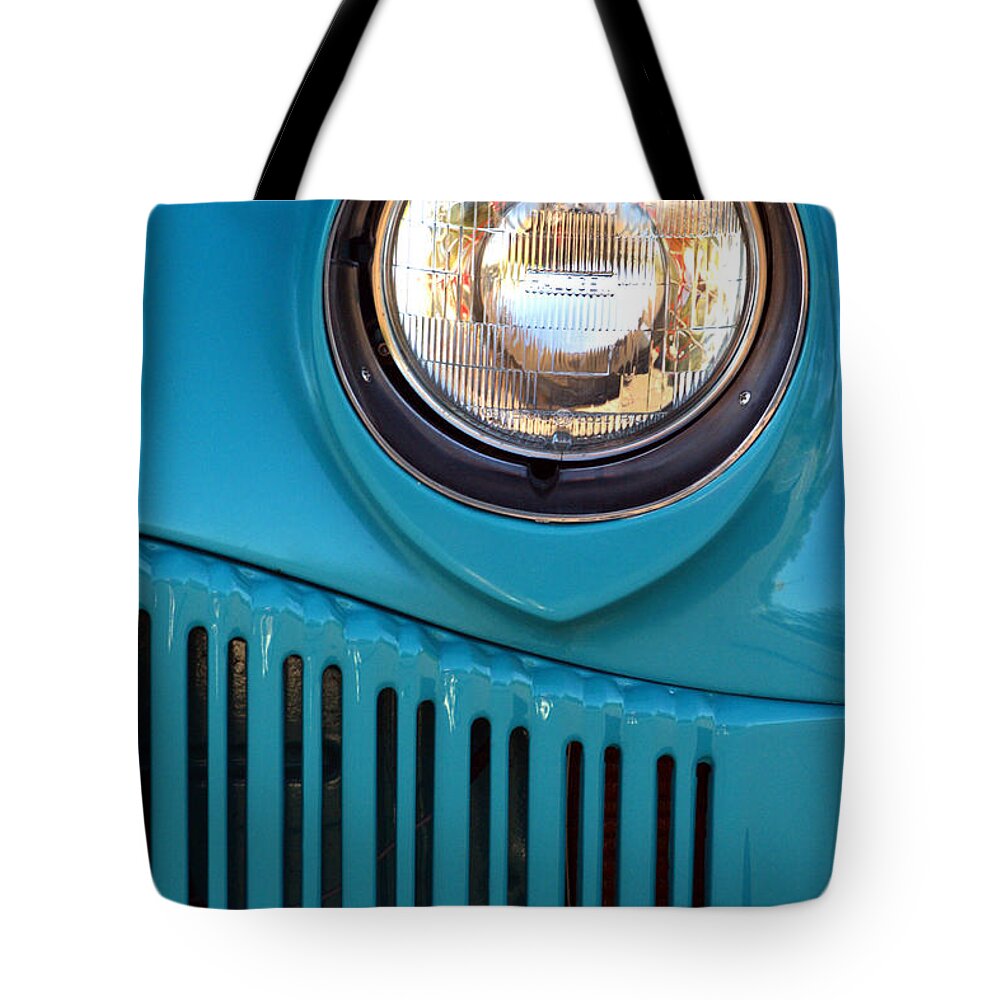 Headlight Tote Bag featuring the photograph Antique Automobile Headlamp by Carol Leigh