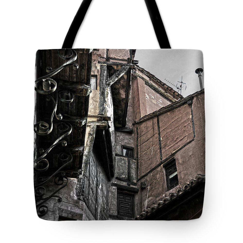 Timbered Tote Bag featuring the photograph Antique ironwork wood and rustic walls by RicardMN Photography
