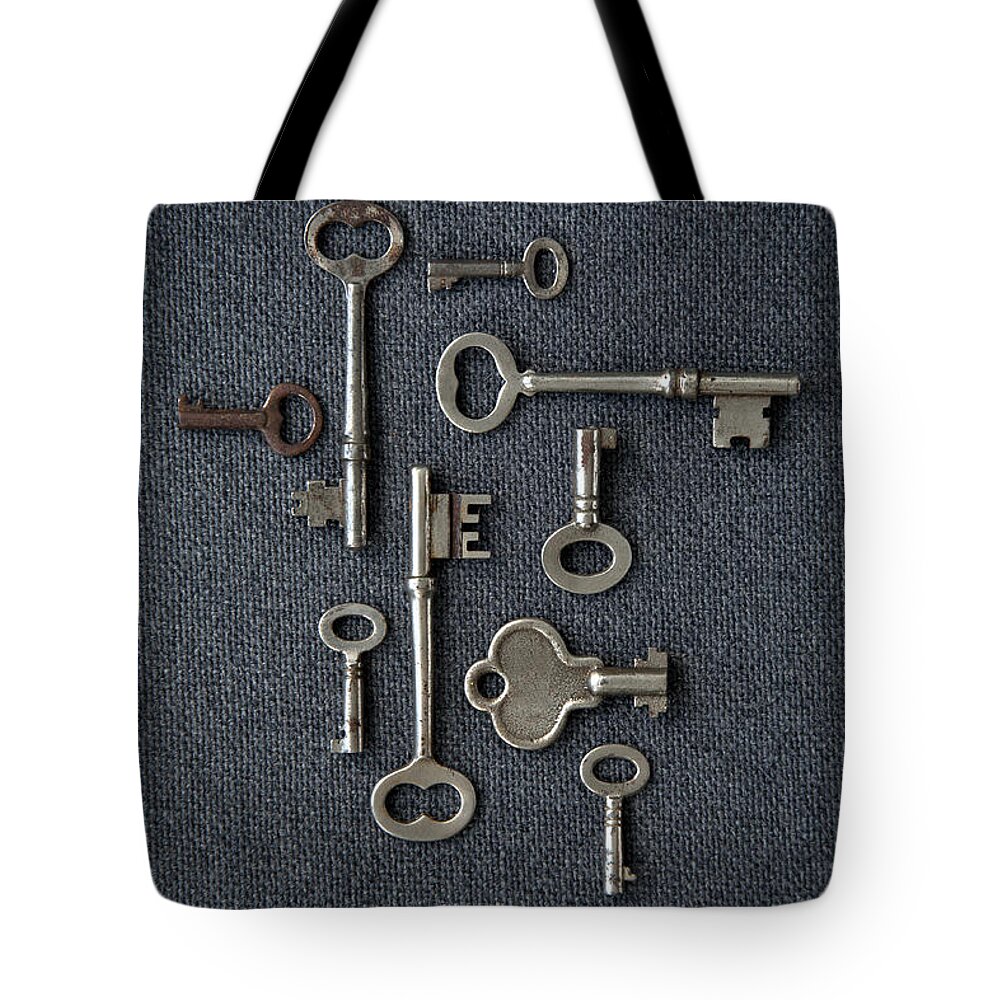 Security Tote Bag featuring the photograph Antique Skeleton Keys by Brad Wenner