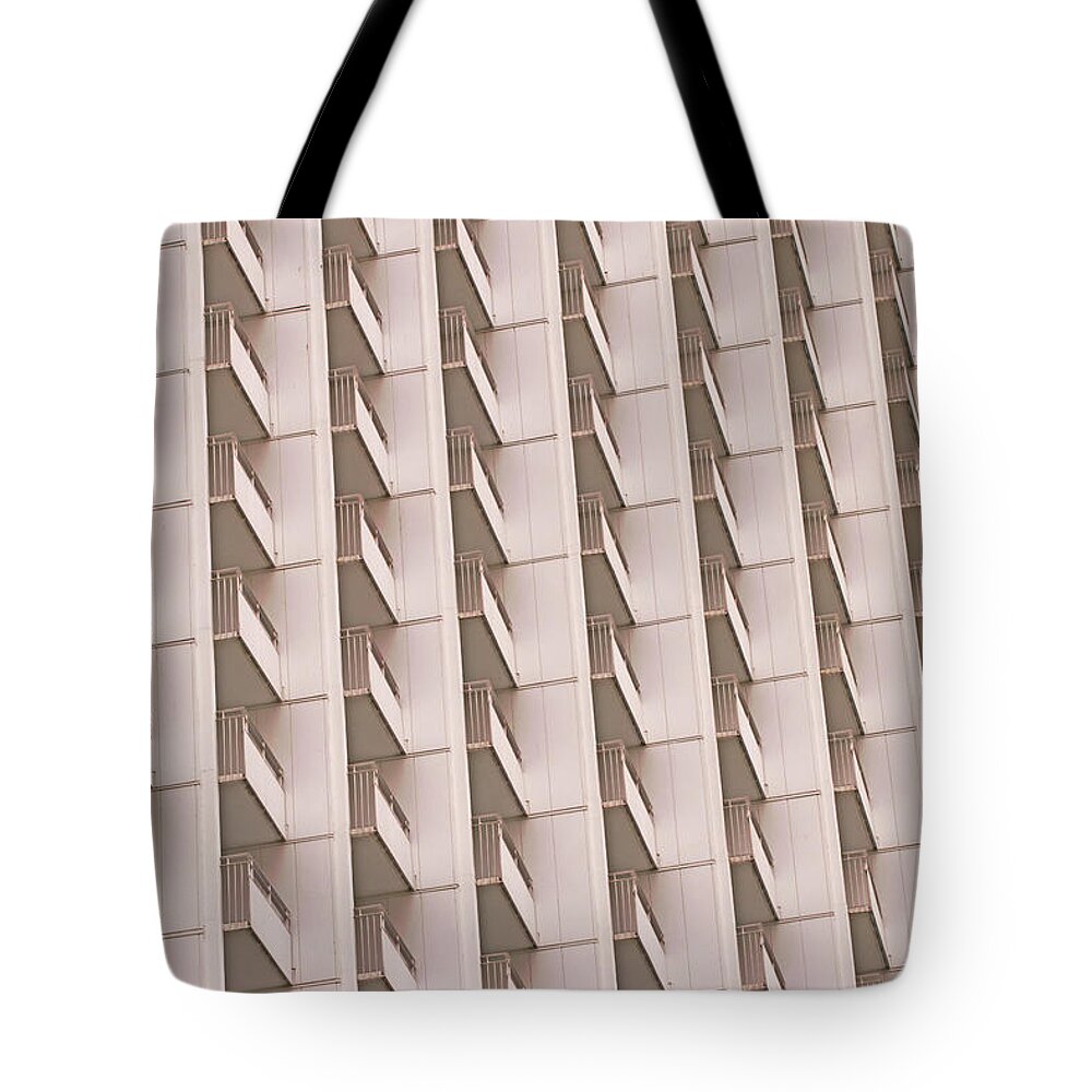 Apartment Tote Bag featuring the photograph Apartment Building With Balcony by Eplisterra