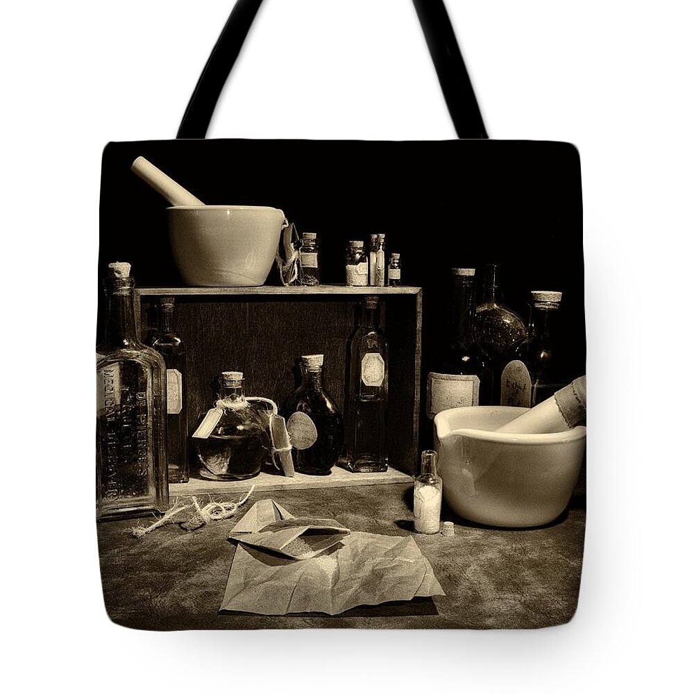 Glassware Tote Bag featuring the photograph Apothecary sepia by Mark Fuller