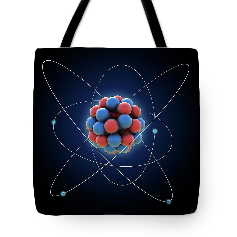 Material Tote Bag featuring the digital art Atom, Artwork by Science Photo Library - Andrzej Wojcicki