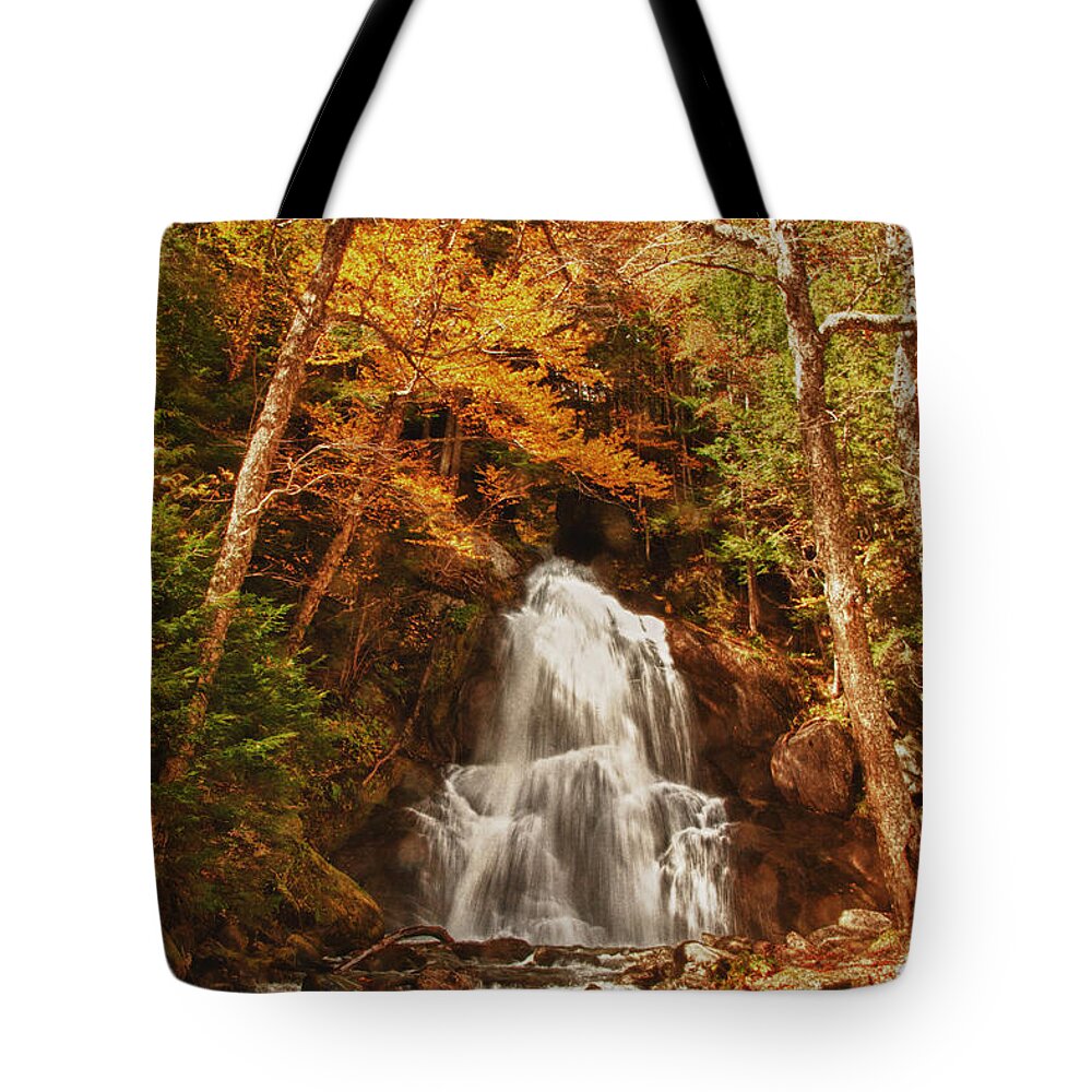 Granville Vermont Tote Bag featuring the photograph Autumn colors over Moss Glen Falls by Jeff Folger