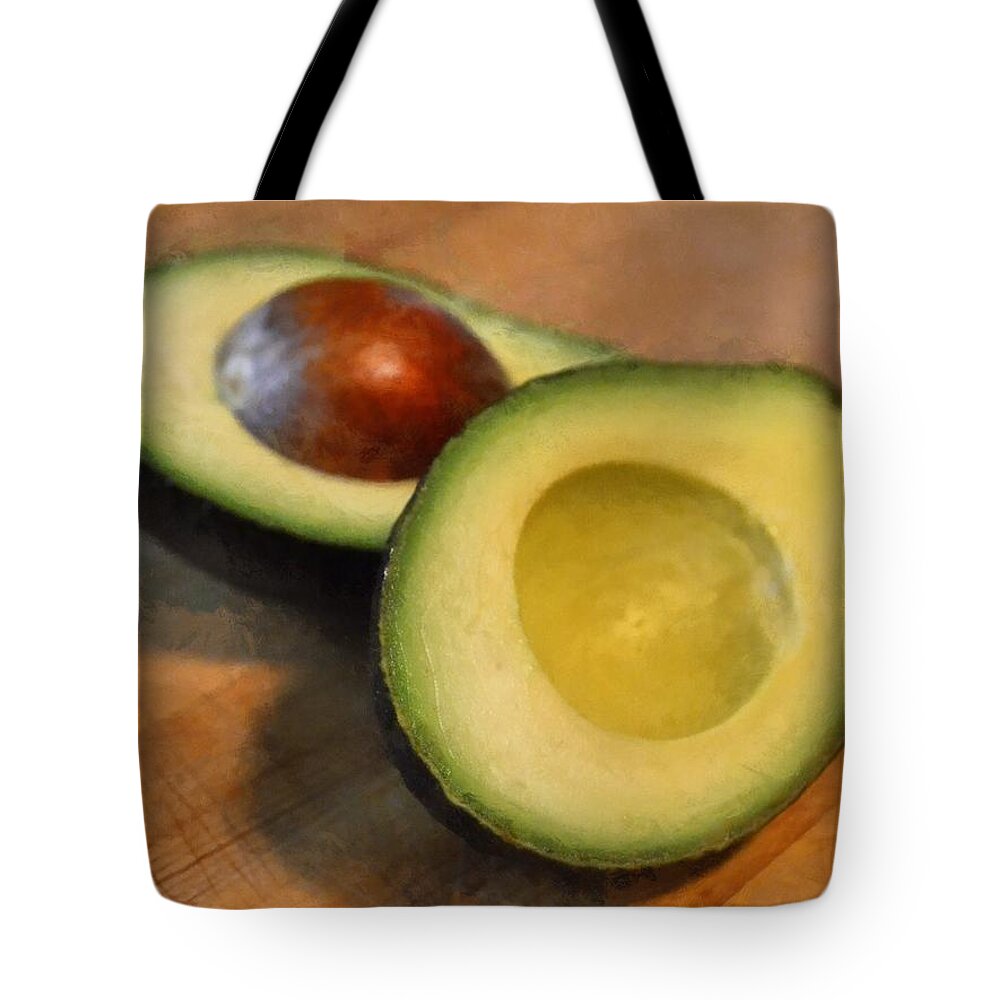 Kitchen Tote Bag featuring the photograph Avocado by Michelle Calkins