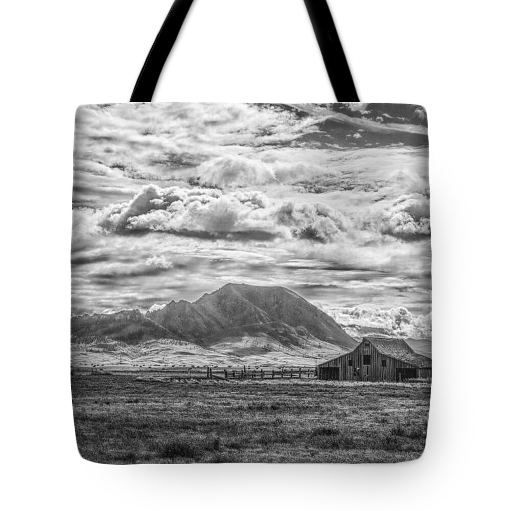 South Dakota Tote Bag featuring the photograph Barn and Bear Butte by Steve Triplett