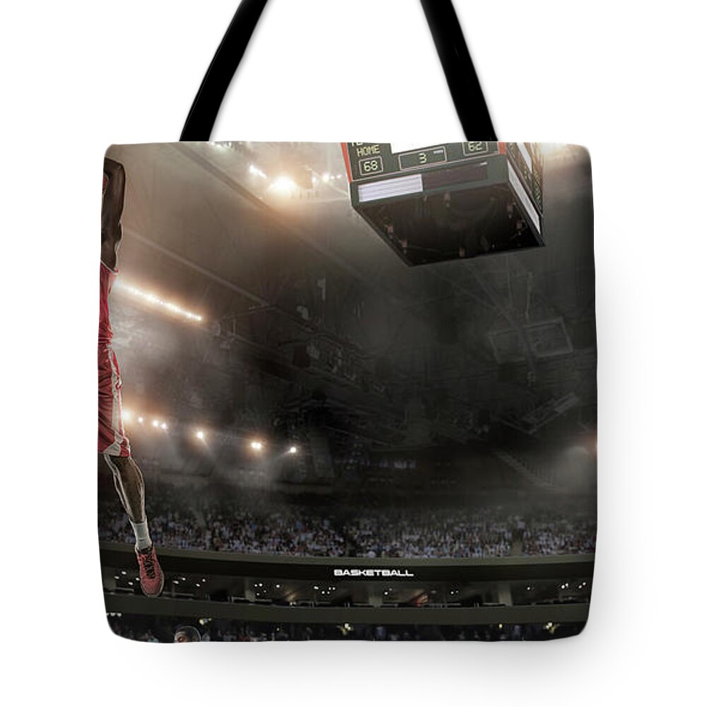 Goal Tote Bag featuring the photograph Basketball Player About To Slam Dunk by Peepo