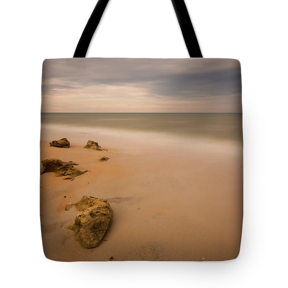 Atlantic Ocean Tote Bag featuring the photograph Beach Rocks by Stefan Mazzola