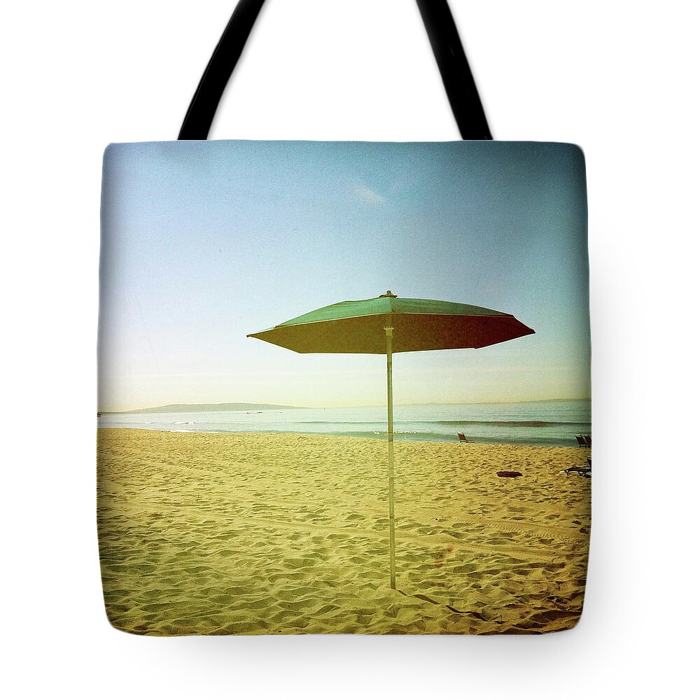 Transfer Print Tote Bag featuring the photograph Beach Umbrella On Sand by Denise Taylor