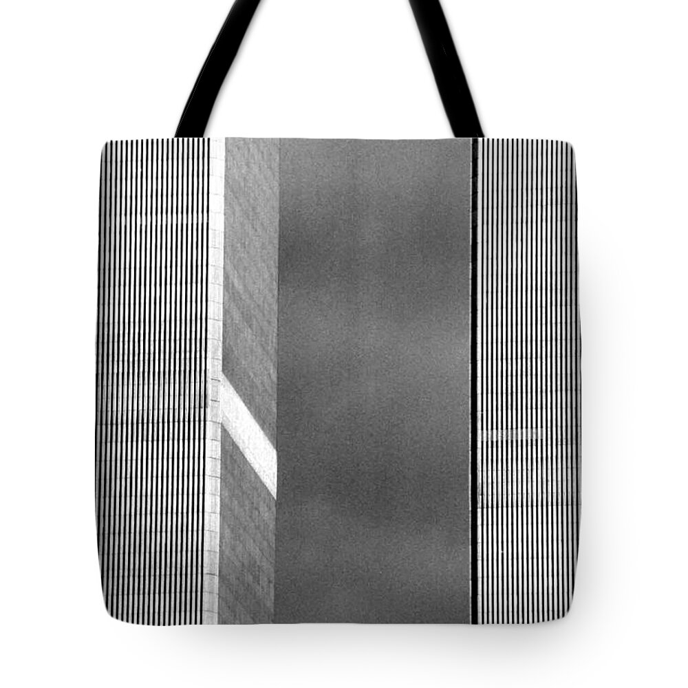 Architecture Tote Bag featuring the photograph Between the tower's by John Schneider
