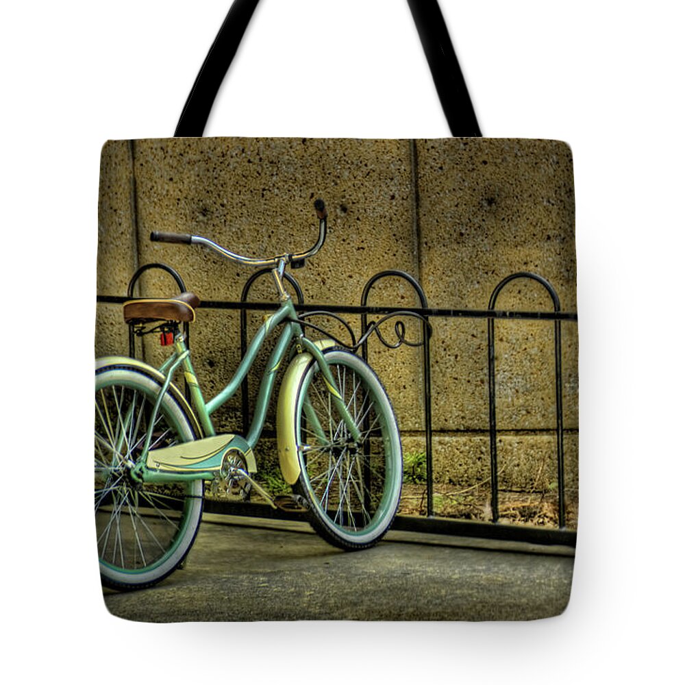 Tranquility Tote Bag featuring the photograph Bicycle In Bike Rack by D.r. Bennett Photograpy
