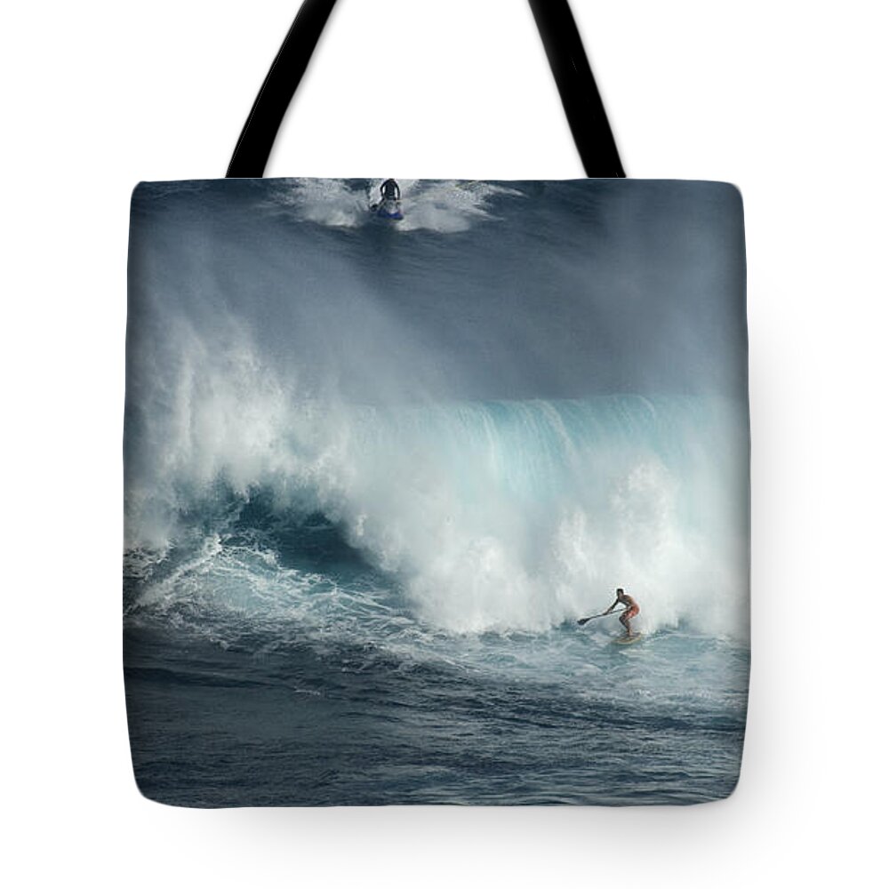 Extreme Sports Tote Bag featuring the photograph Big Wave Surfers Maui by Bob Christopher
