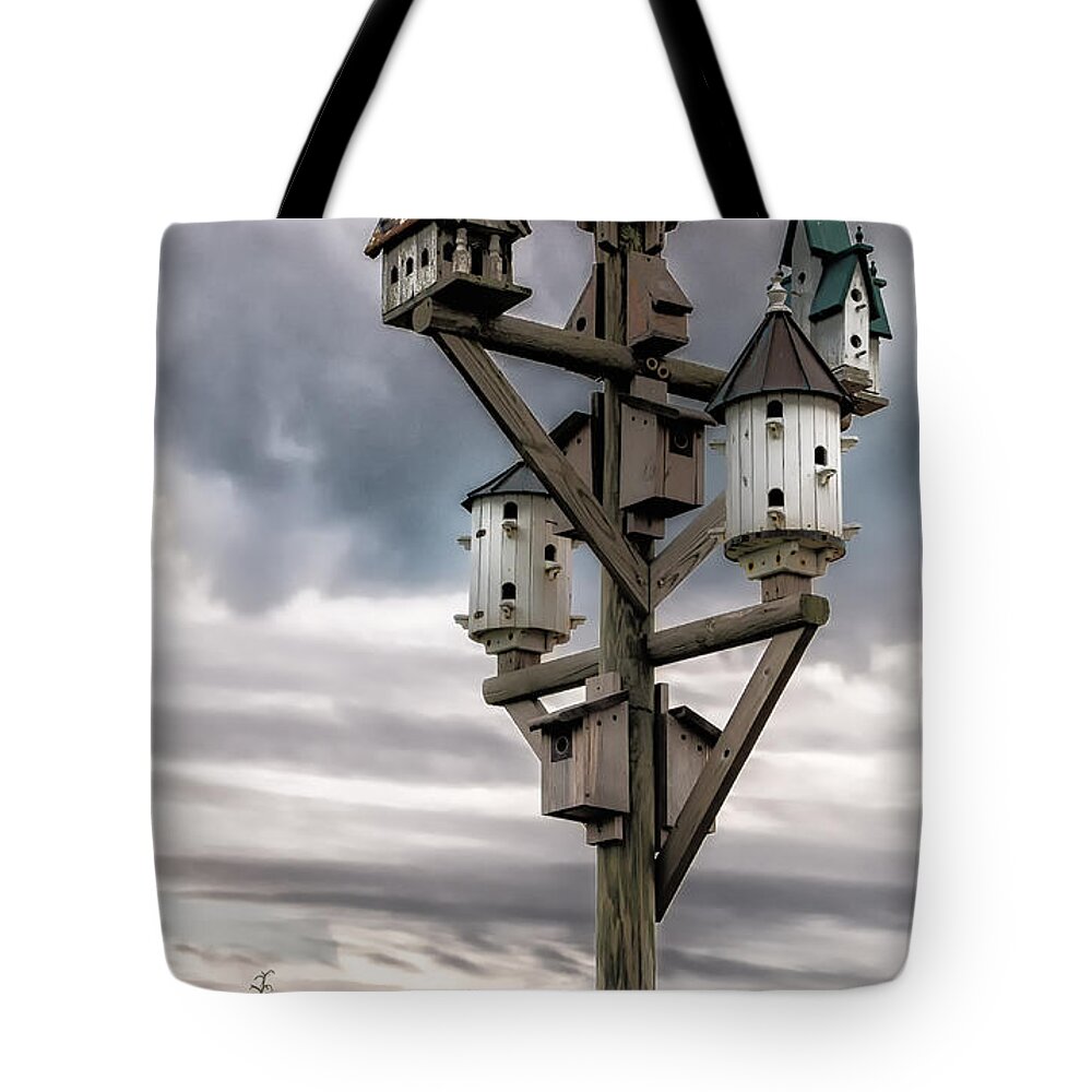 Beach Tote Bag featuring the photograph Bird Condo by Georgette Grossman