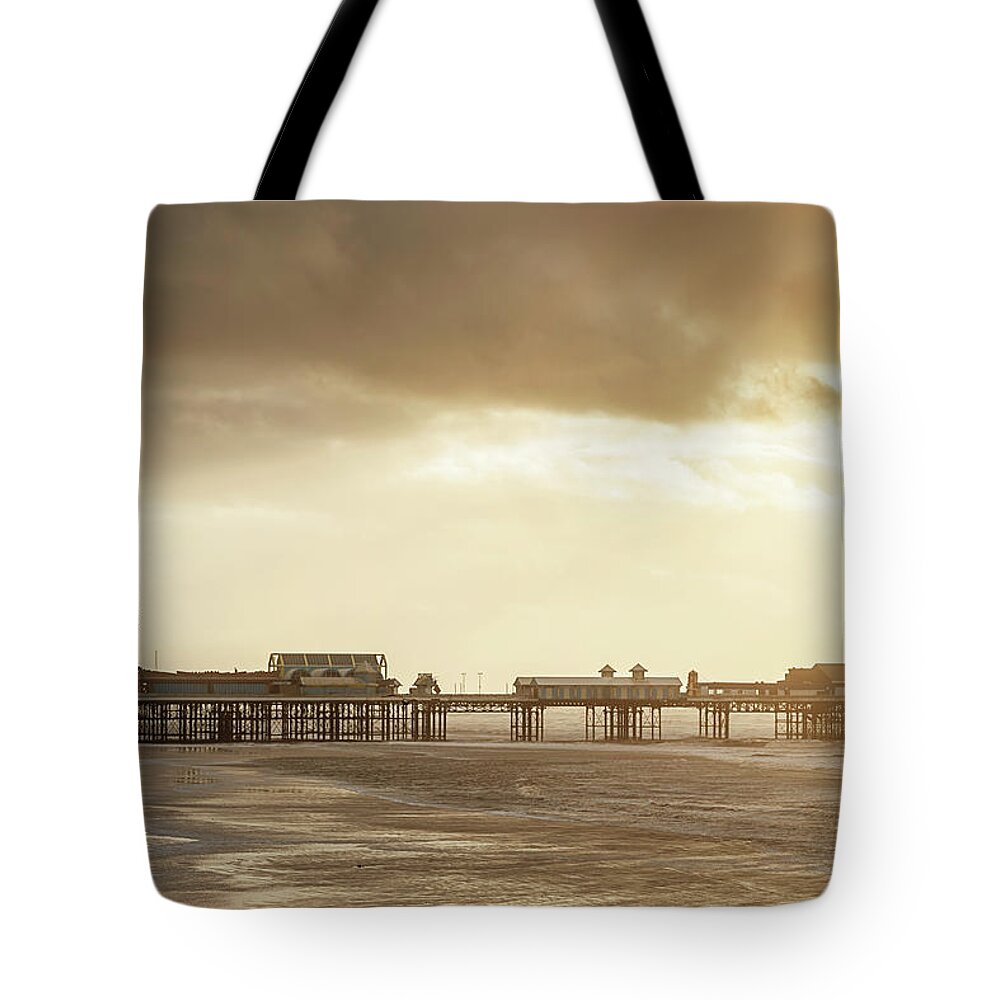 Recreational Pursuit Tote Bag featuring the photograph Blackpool Central Pier At Sunset by Mlenny