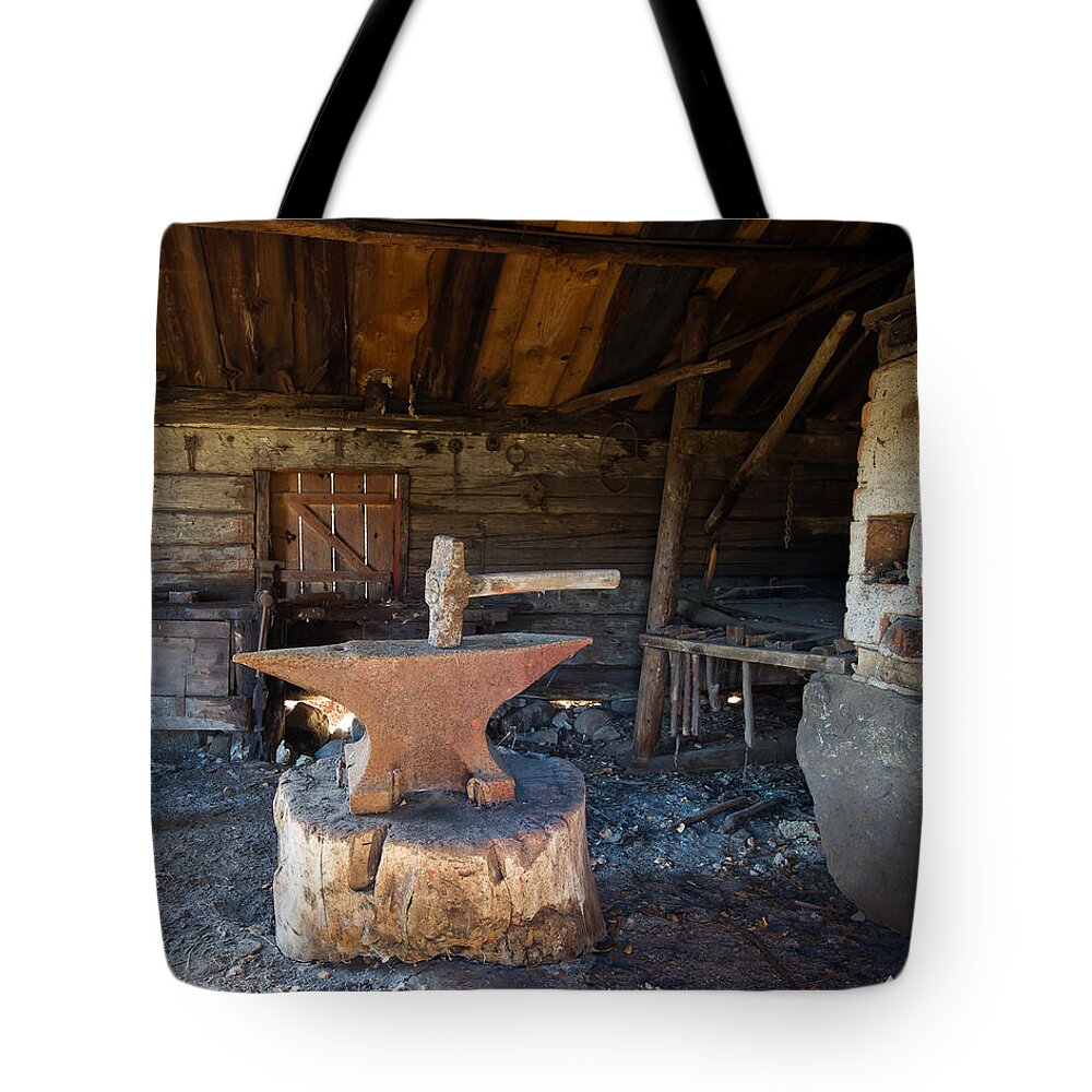 Blacksmiths Tools Tote Bag featuring the photograph Blacksmiths tools by Torbjorn Swenelius