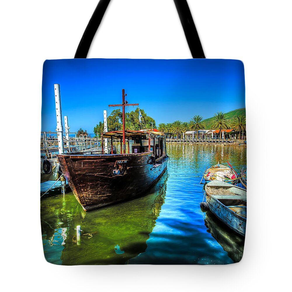 Israel Tote Bag featuring the photograph Boats at Kibbutz on Sea Galilee by David Morefield