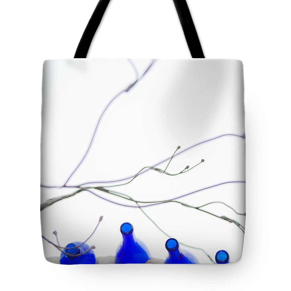 Bottle Tote Bag featuring the photograph Bottles and Branches by Jo Ann Tomaselli