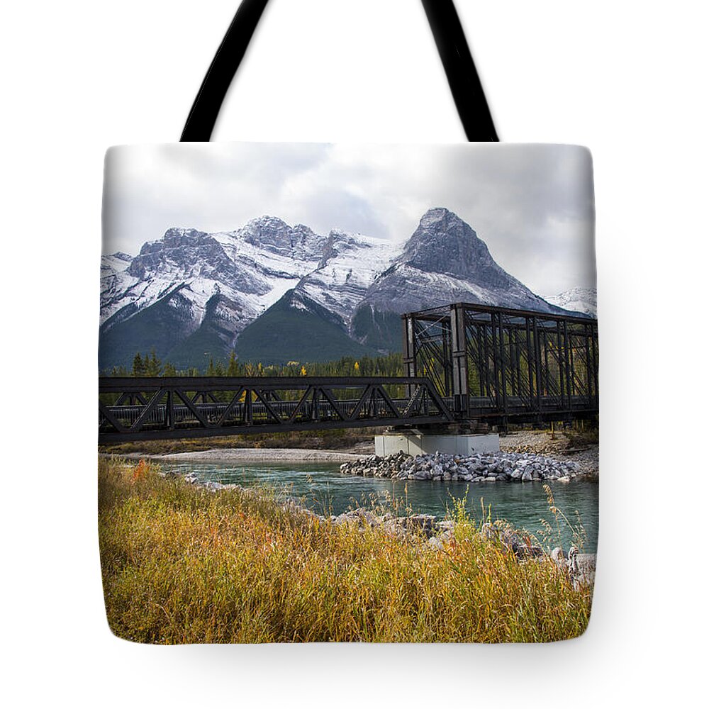 Canmore Tote Bag featuring the photograph Bow River Railroad Trestle by Bob Phillips