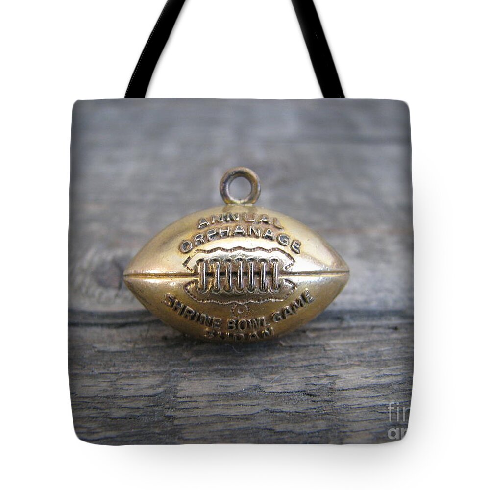 Shriner Bowl Game Pendant Tote Bag featuring the photograph Bowl Game by Michael Krek