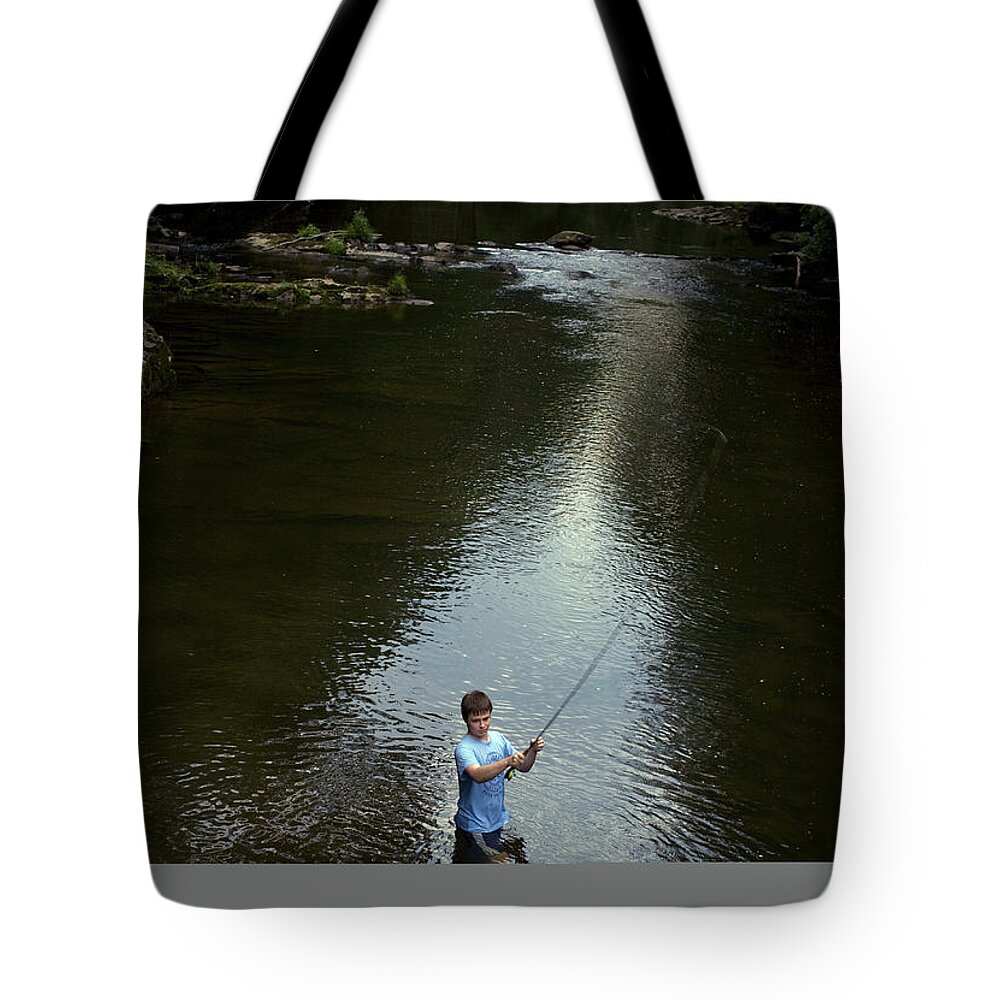 Carefree Tote Bag featuring the photograph Boy Fly Fishes In River In Nc by Darron R. Silva