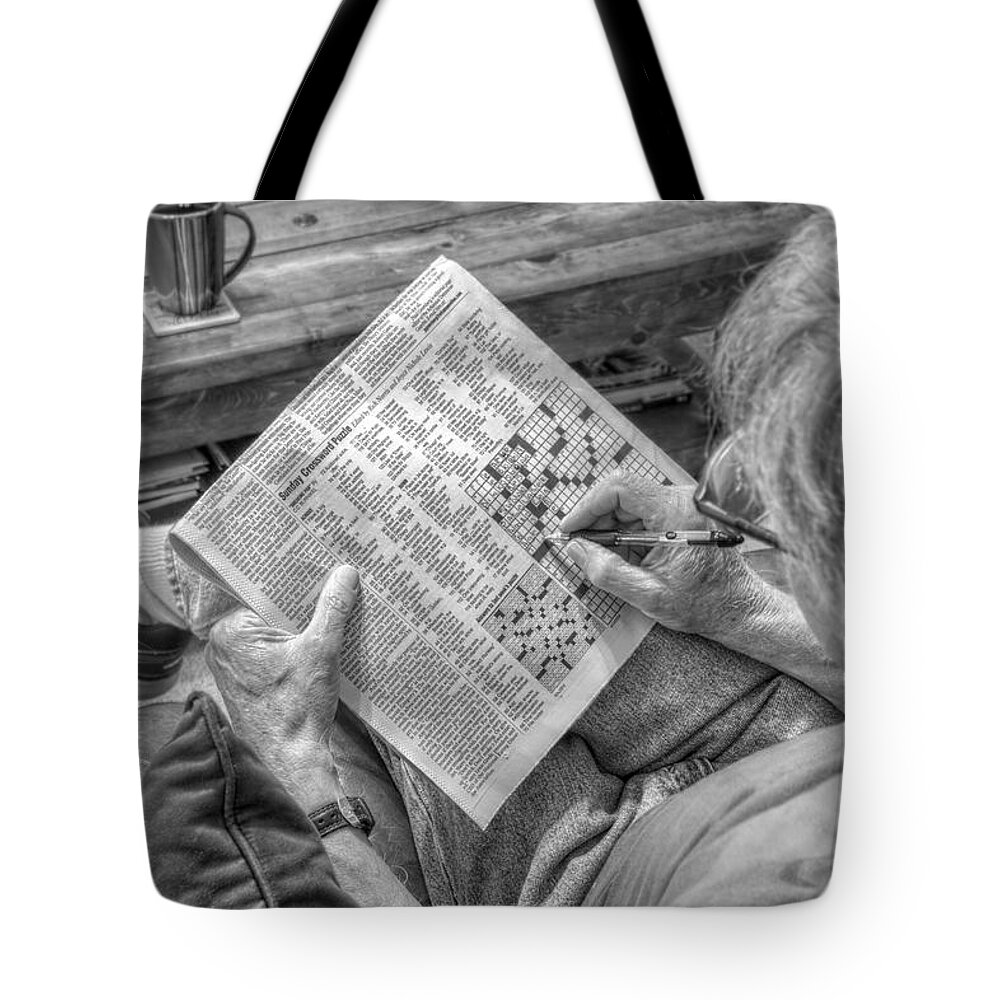 Sunday Crossword Puzzle Tote Bag featuring the photograph Mind Games - Sunday Crossword Puzzle - Black and White by Jason Politte