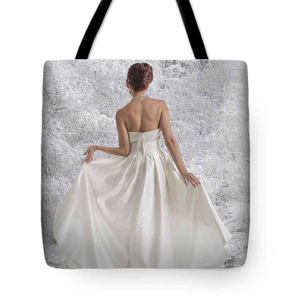 Model Tote Bag featuring the photograph Bride in the snow by Angela Stanton