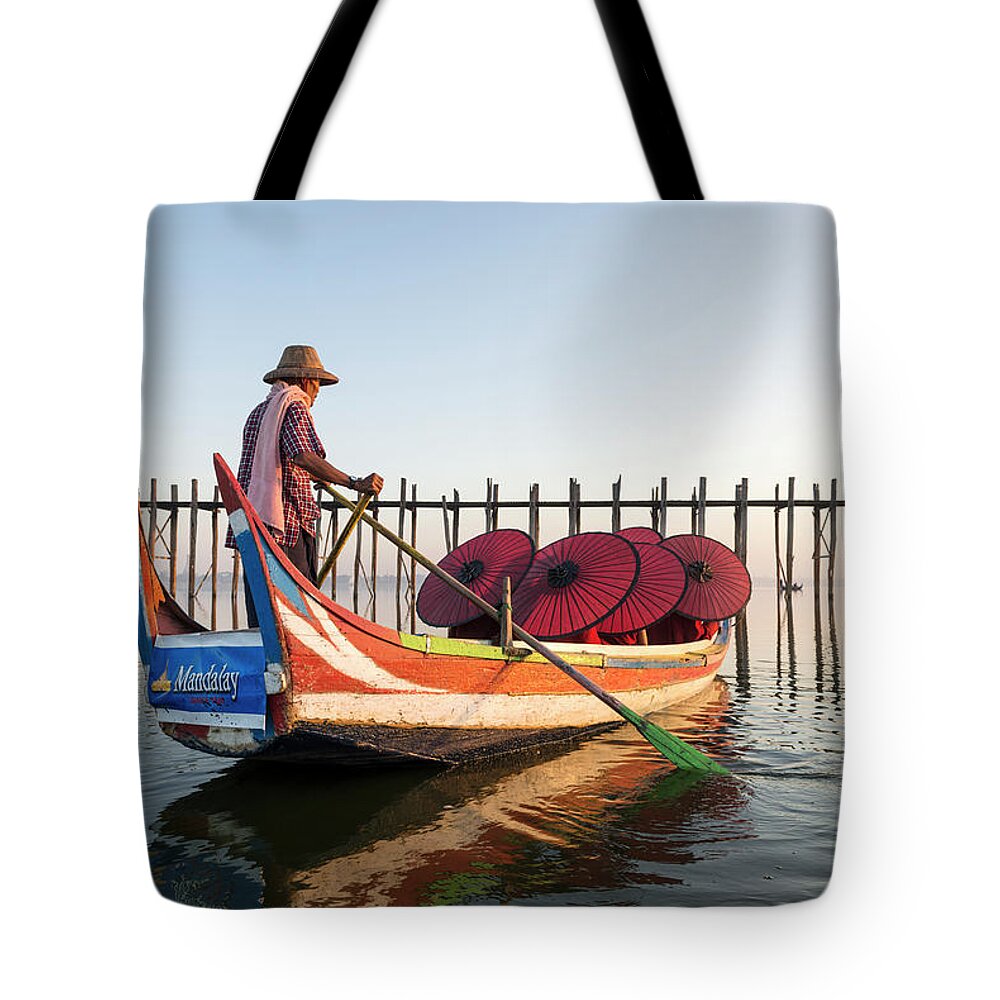 Young Men Tote Bag featuring the photograph Buddhist Monks And Sightseeing Boat by Martin Puddy