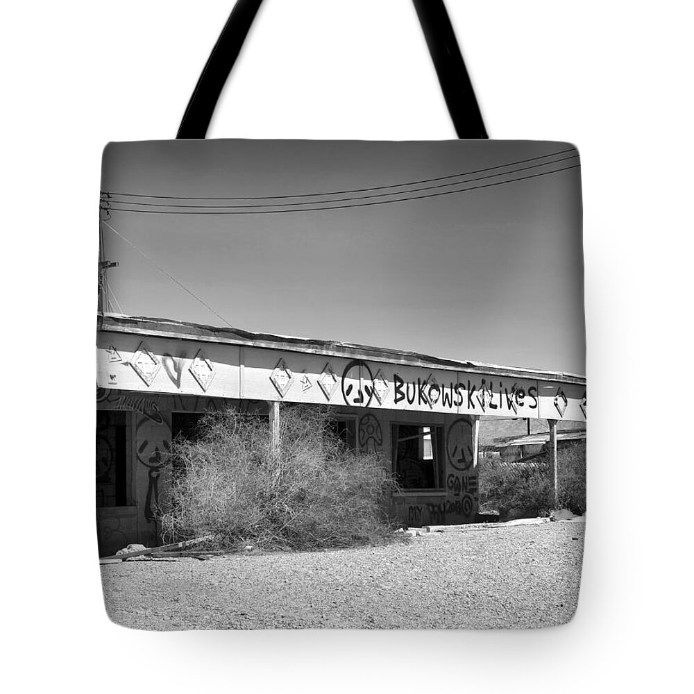 Salton Sea Tote Bag featuring the photograph Bukowski Lives by Dominic Piperata