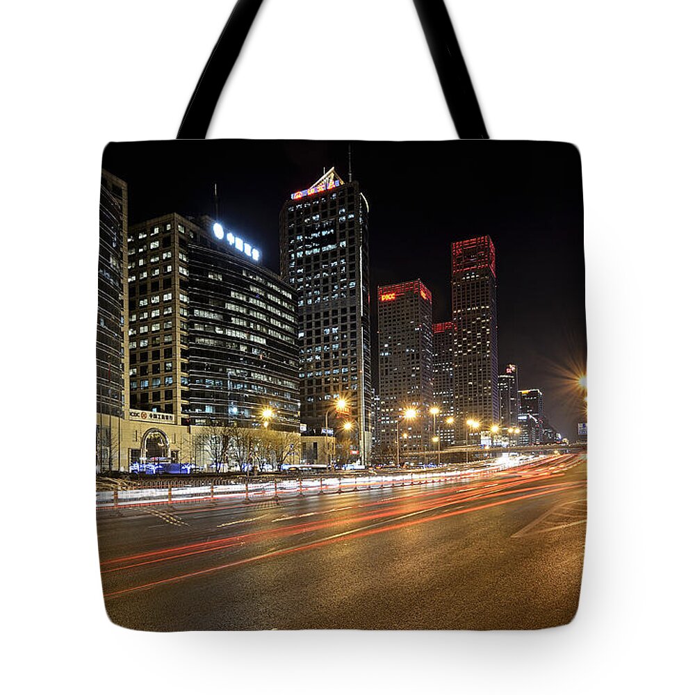 central Business District Tote Bag featuring the photograph Busy Beijing Night - Central Business District by Brendan Reals