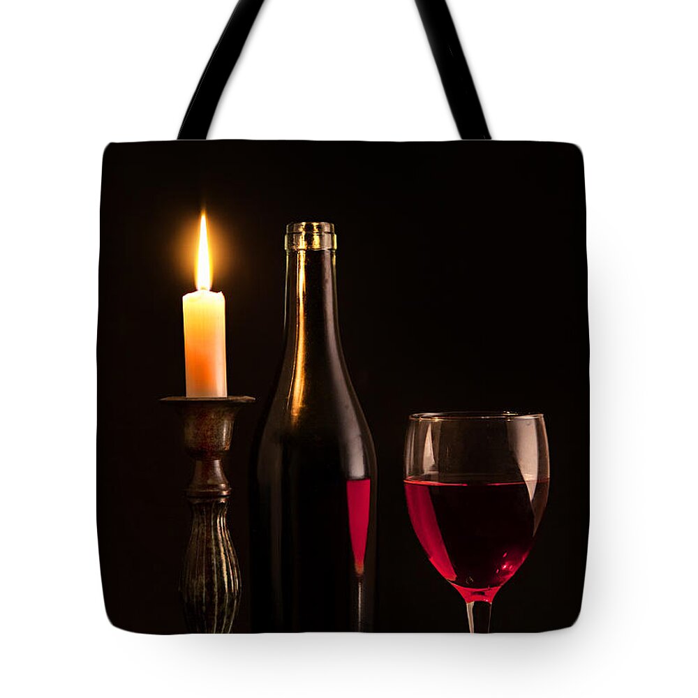 Wine Tote Bag featuring the photograph By candlelight by Bill Wakeley
